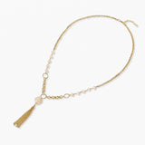 Long gold-plated necklace with freshwater pearls, chunky chain links, and flowing tassel pendant