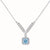 Sterling silver necklace with geometric crystal arrangement forming a V-shape and square blue moissanite centerpiece pendant