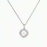 Cushion-shaped double halo pendant with 10mm freshwater pearl center on rhodium-plated sterling silver chain