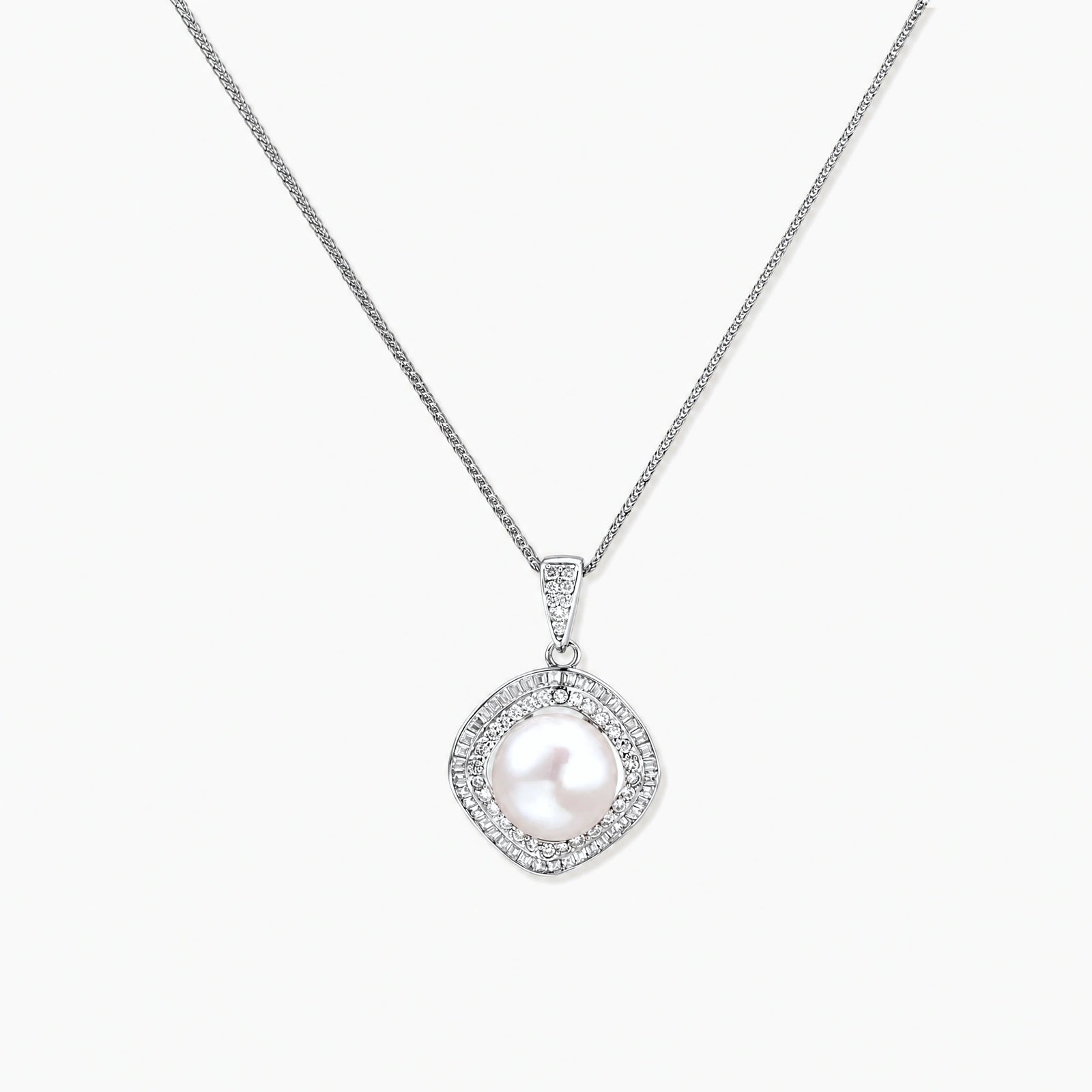 Cushion-shaped double halo pendant with 10mm freshwater pearl center on rhodium-plated sterling silver chain