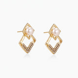 Gold-plated double square frame earrings with freshwater pearl and crystal accents on white background
