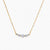 Delicate 14K gold-plated necklace with five graduated zirconia stones arranged in a curved arc on fine chain