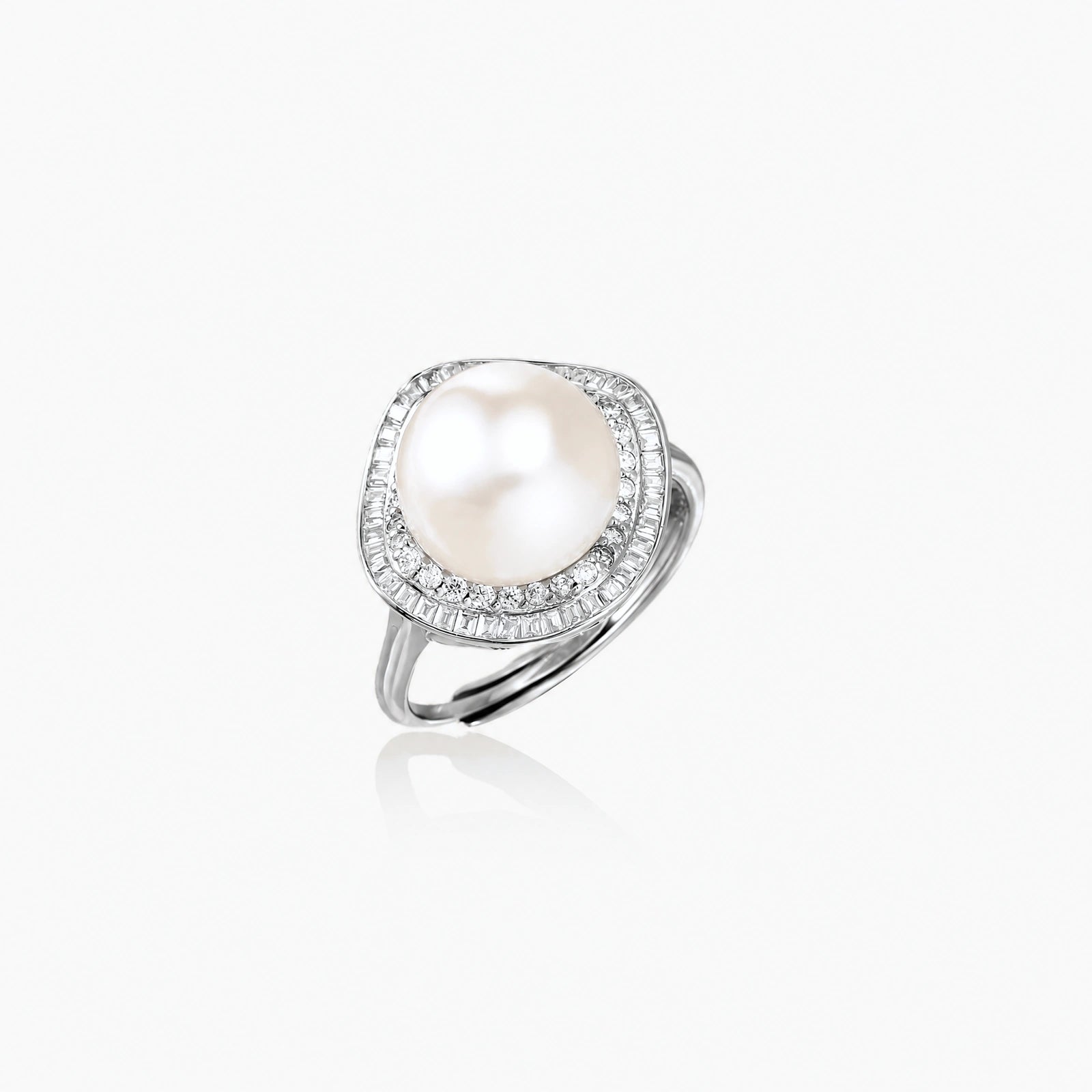 Rhodium-plated silver ring with round pearl center, double halo of baguette and round crystals forming cushion shape