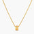 Gold-plated cylindrical ring pendant with brushed finish and scattered crystal accents on a wheat-link chain, cream background.
