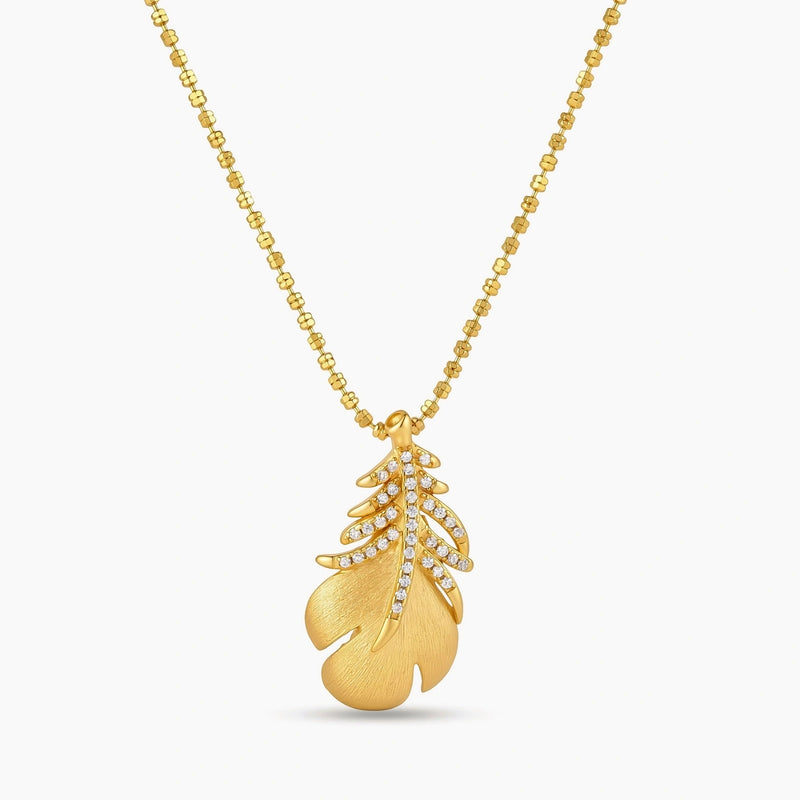 18K gold-plated 925 silver leaf pendant with brushed finish and cubic zirconia accents on a beaded ball chain.