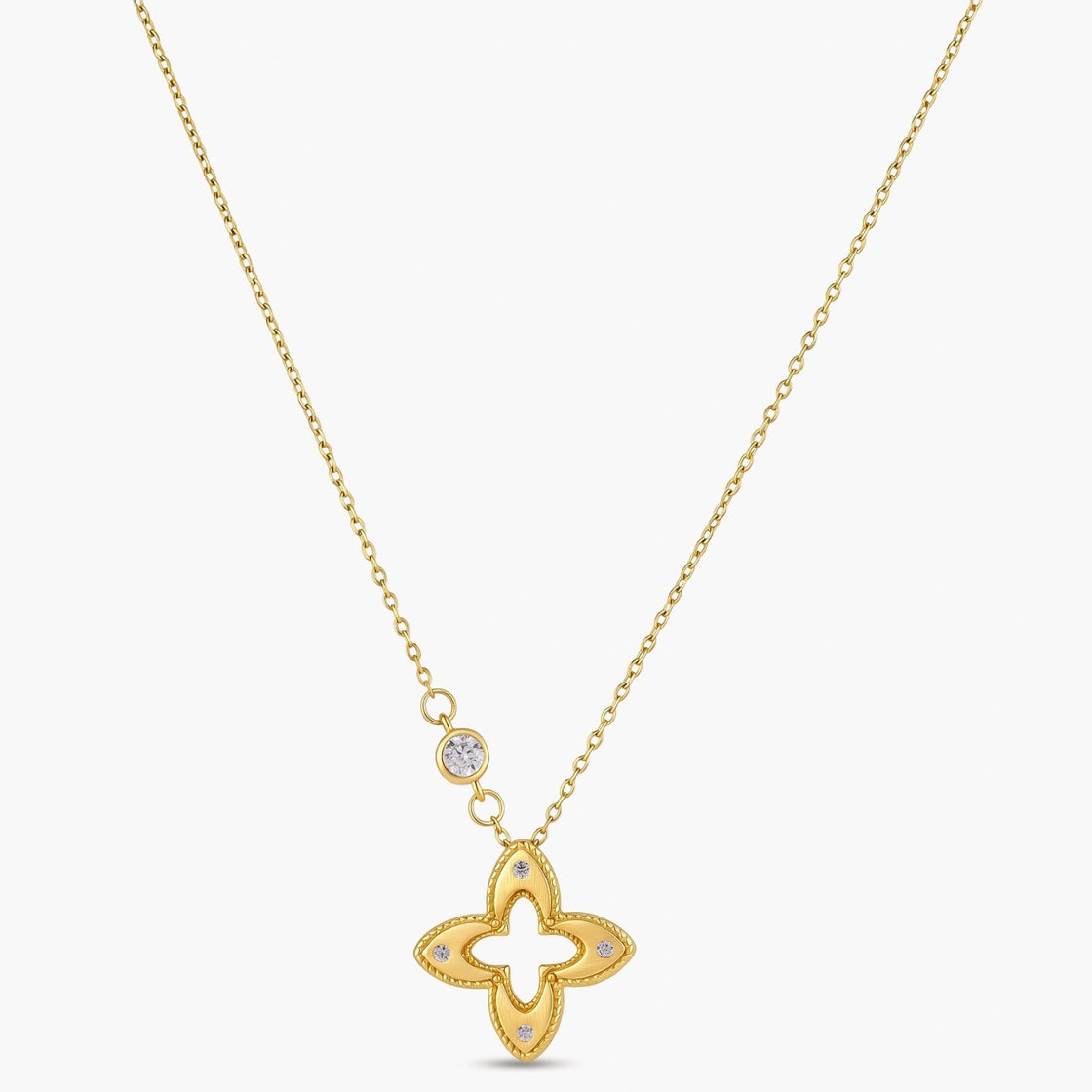 18K gold-plated 925 silver necklace with open four-petal flower pendant, CZ accents, bezel-set stone on chain, white background.