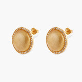 Pair of round dome stud earrings in brushed 18K gold-plated silver with a sparkling CZ halo border, push-back closure.