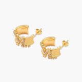 Pair of 18K gold-plated 925 sterling silver C-hoop earrings with brushed finish and scattered cubic zirconia clusters.