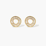 Gold-plated necklace and earring set with circular CZ crystal pendants featuring radial design on cream background